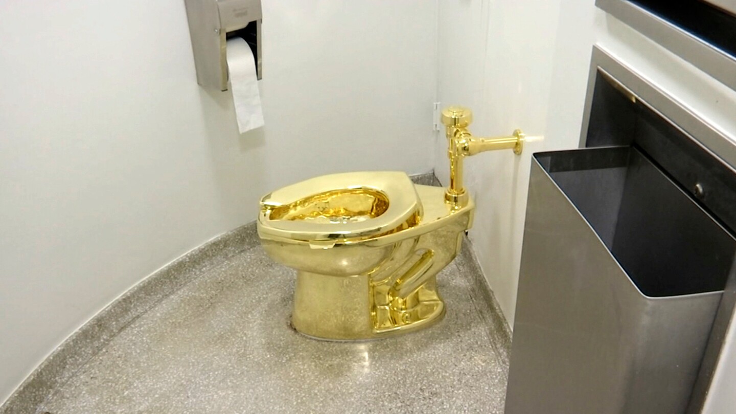 Solid gold toilet ‘America’ by Maurizio Cattelan goes on sale at Sotheby’s